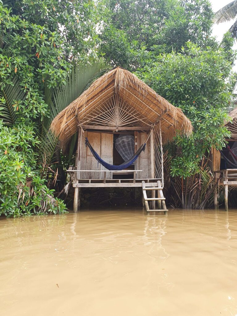 Bamboo hut on a river in Kampot, Cambodia