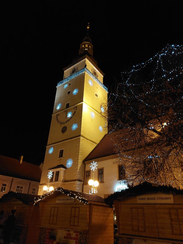 Town tower with a Christmas market below