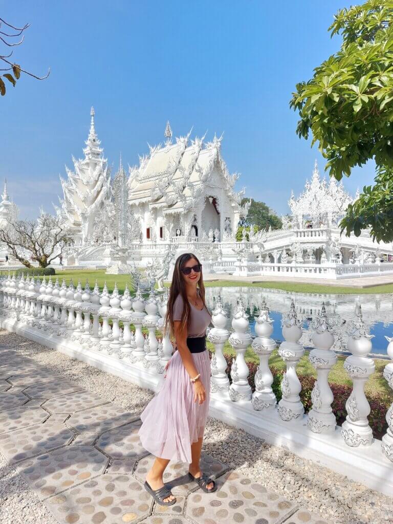 Mirka posing outside of the White Temple in Thailand
