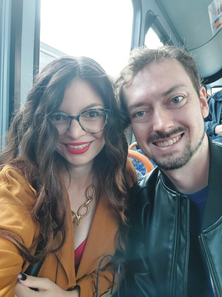 Mirka and Daniel taking a selfie on a bus