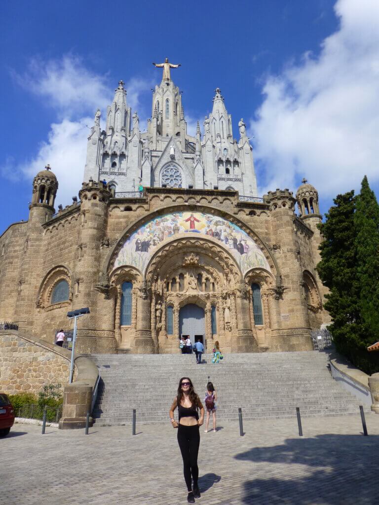 Mirka standing outside of a church