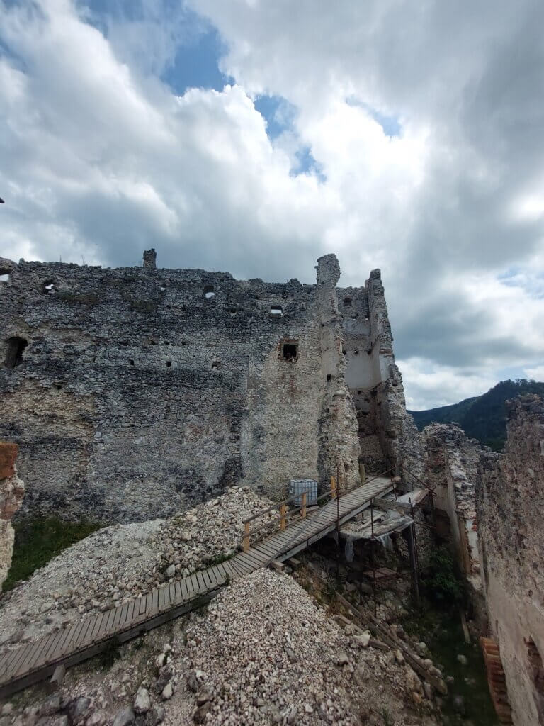 Castle ruins with a new wooden pathway going through them