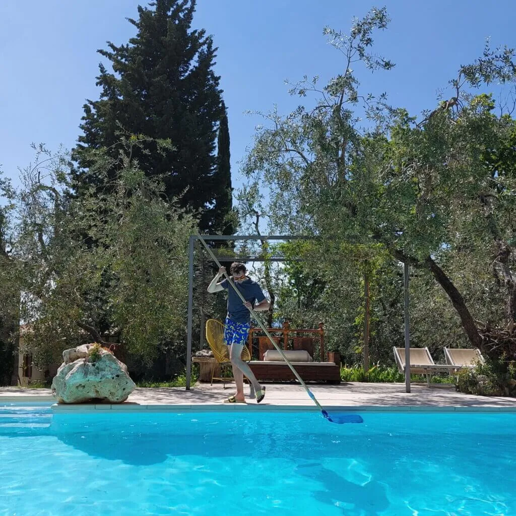 Home 6 Daniel cleaning a pool