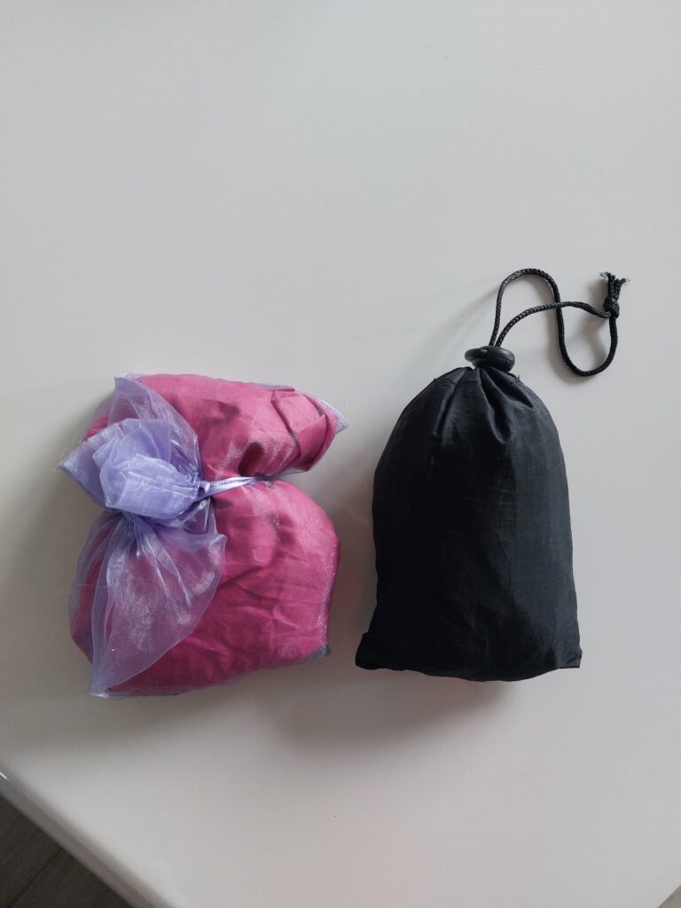 Organza bag and a black pouch 