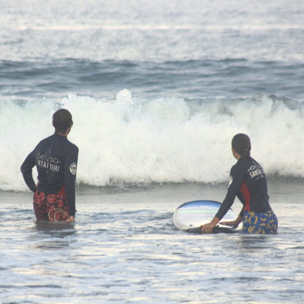 Mirka and Daniel surfing