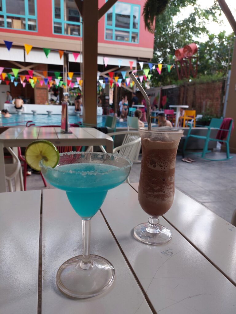 Cocktails in a hostel pool area