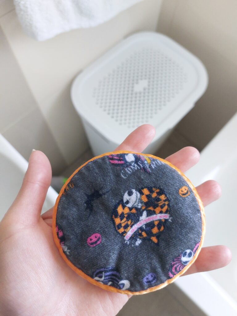 Round makeup remover cloth with Nightmare Before Christmas motif