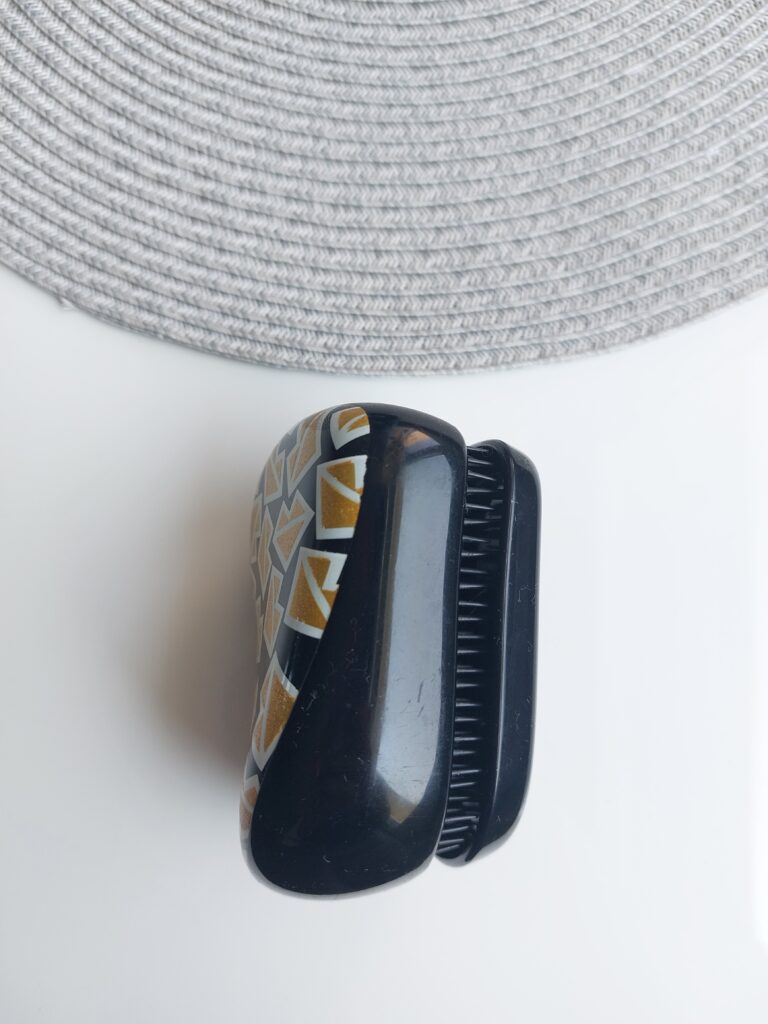 Tangle Teezer brush from the side with the protective cover on