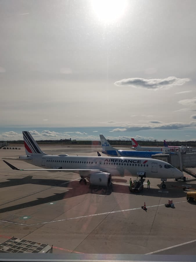 3 parked planes at the airport