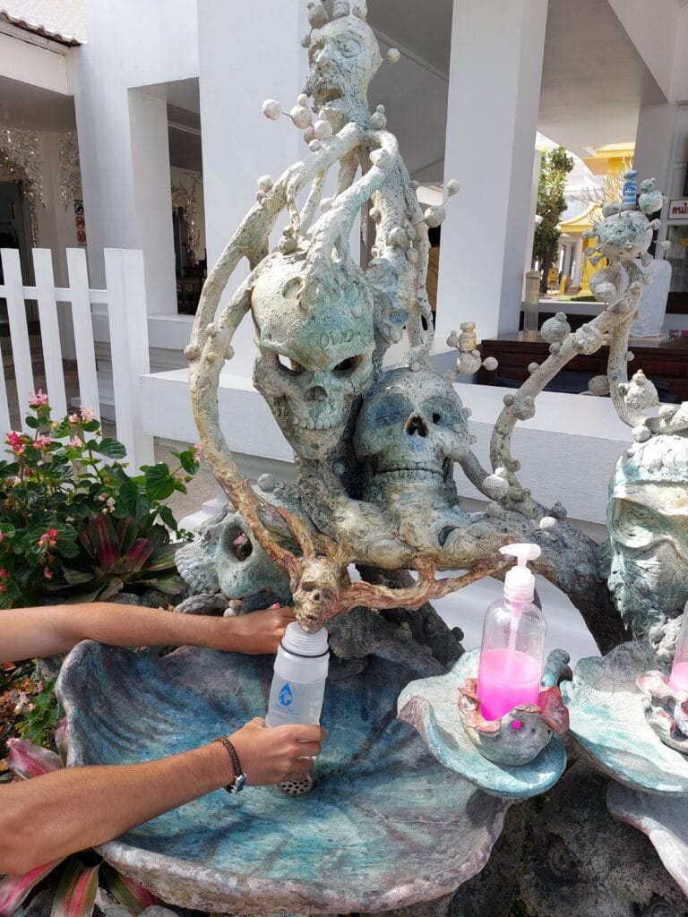 Free Water at Airports: Never Overpay for Water Again 8 An arty sink with skulls
