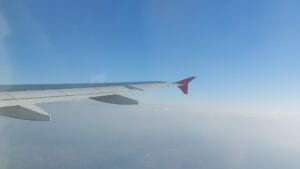 Plane's wing in the sky