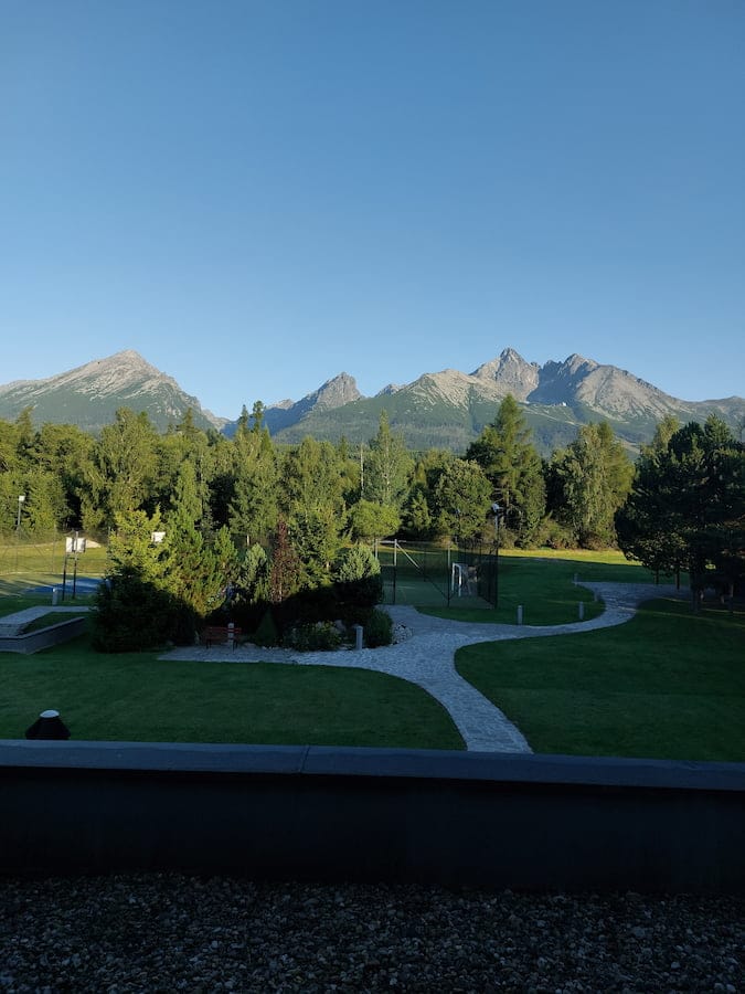 A view of mountains from a hotel room