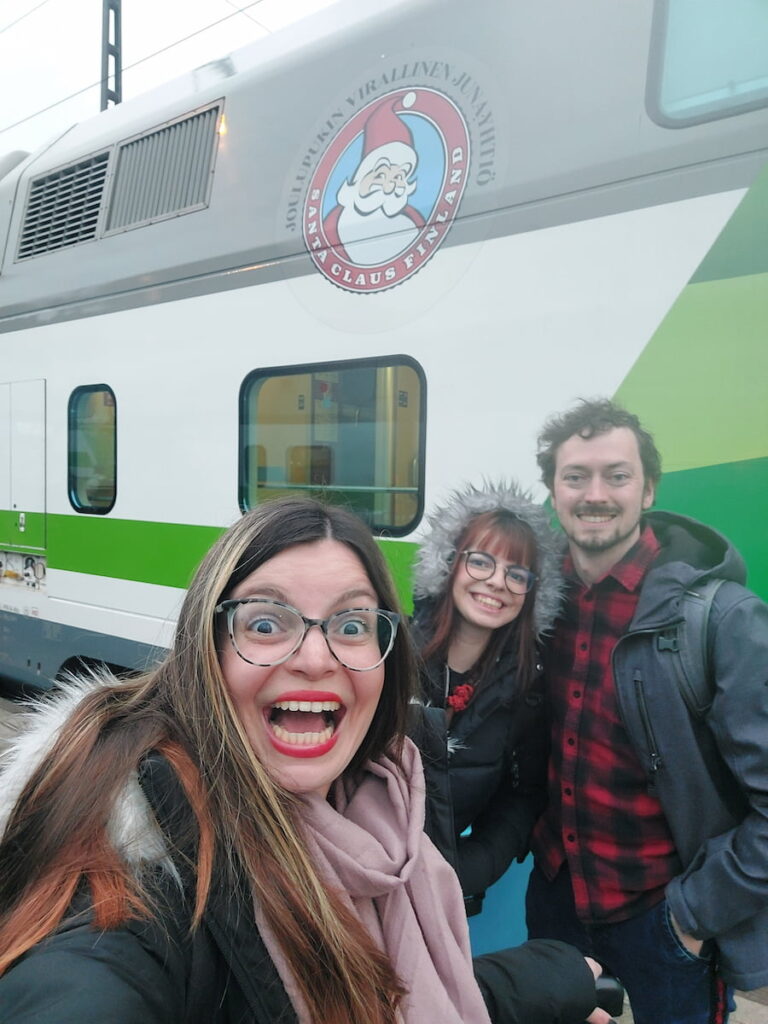 Posing in front of the Santa Claus Express train