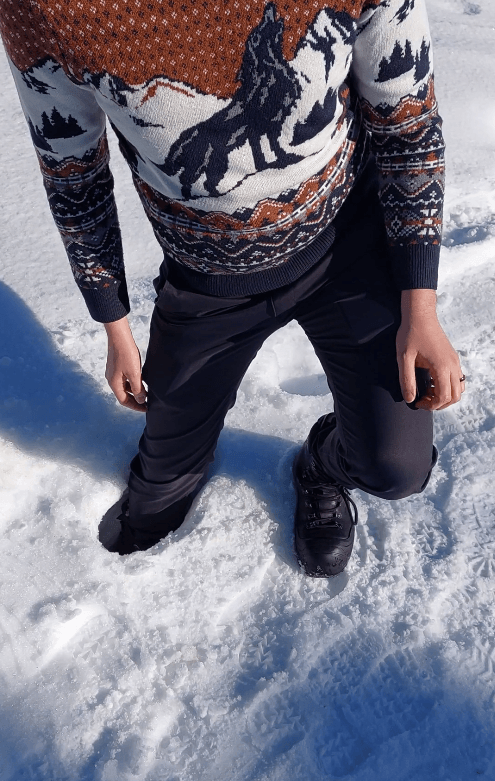 Daniel's leg in a snow up to his thigh