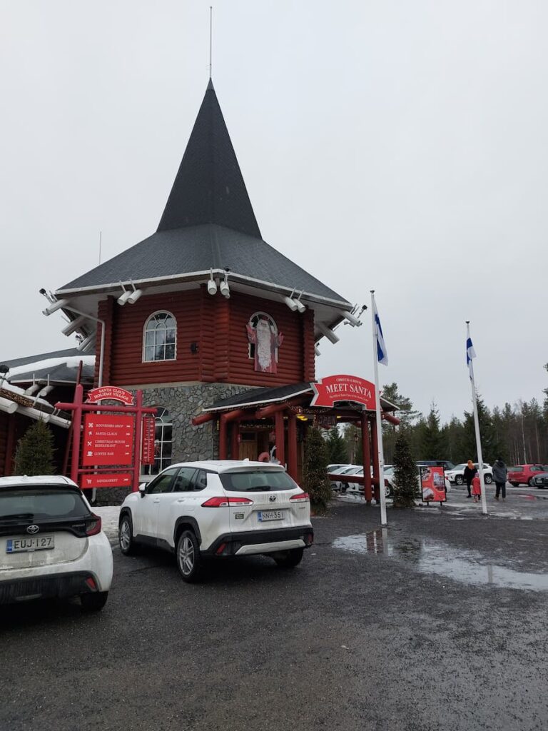 Fake Santa's building with cars in front of it