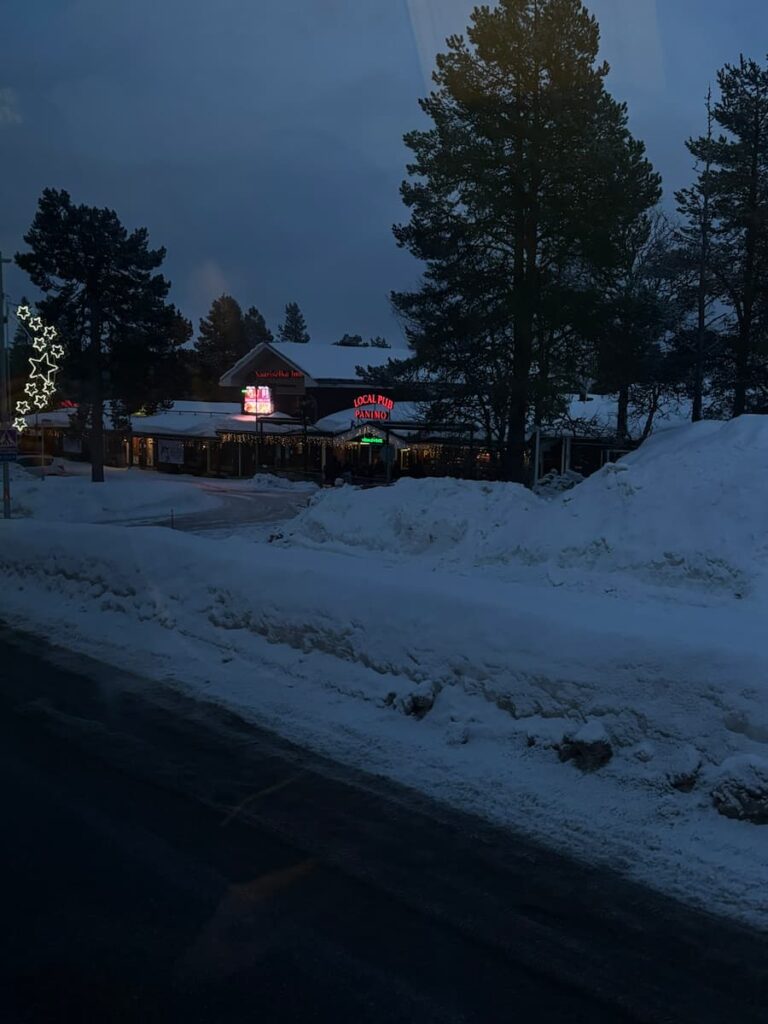 Snowy village at night