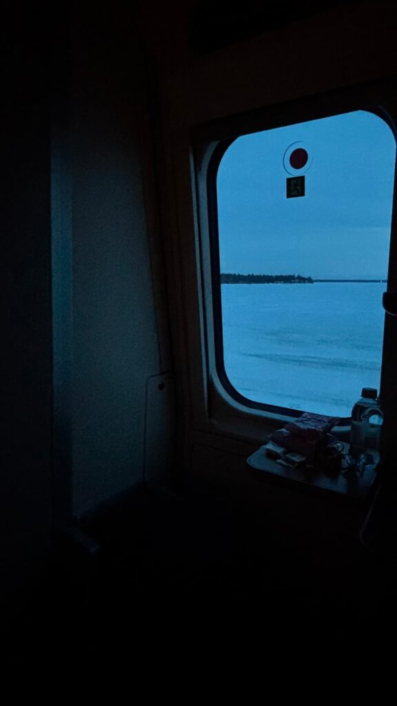 Window view on the Santa Claus Express train with snowy landscape