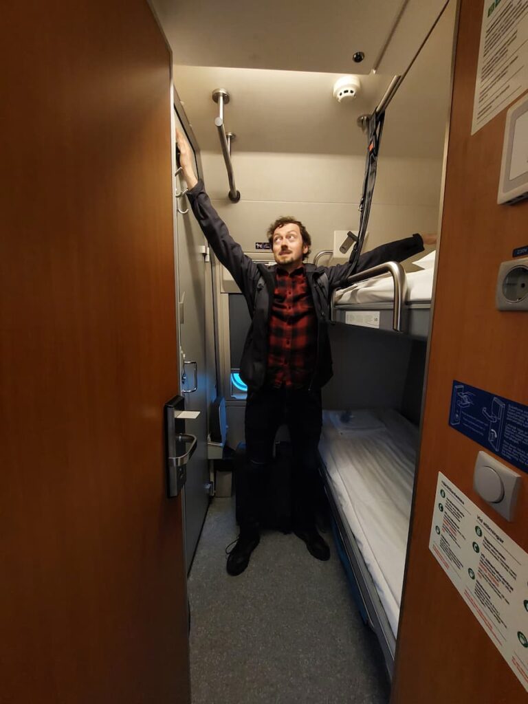 Santa Claus Express Train: The Ultimate Guide 16 Daniel showing a narrow cabin on the Santa Claus Express train