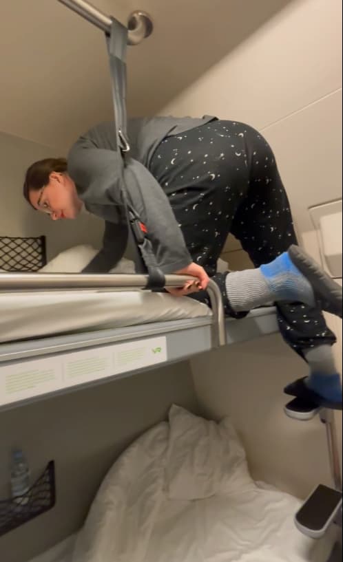 Santa Claus Express Top Bunk: What Surprised Us 7 Mirka climbing into the Santa Claus Express top bunk