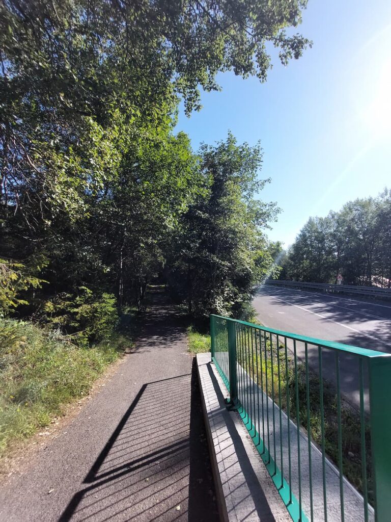 Pedestrian path next to a road in the High Tatras