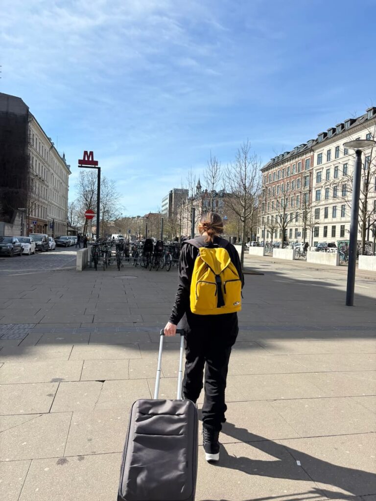 Mirka dragging a suitcase in Copenhagen