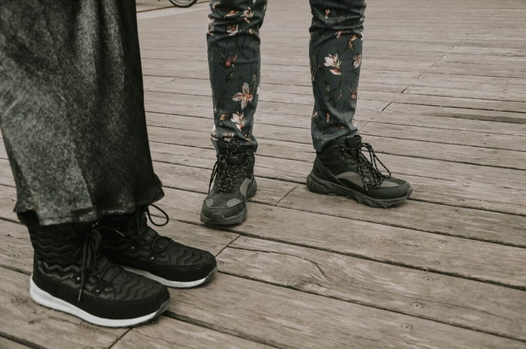 Snowboots and hiking boots on a wedding day