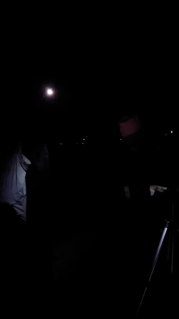 A dark picture of a torch light