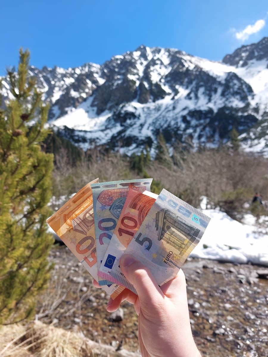 Mirka beneath a snowy mountain in the High Tatras in the spring
