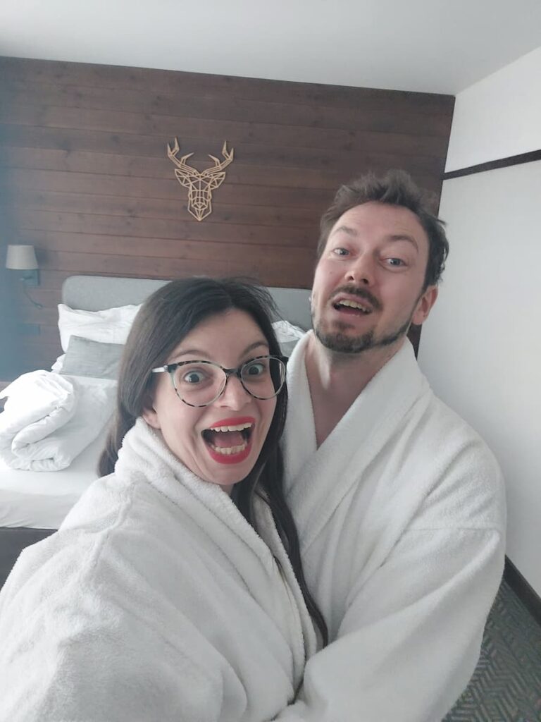 High Tatras on a Budget: 12 Money-Saving Tips 4 Mirka and Daniel in spa dressing gowns in a hotel room
