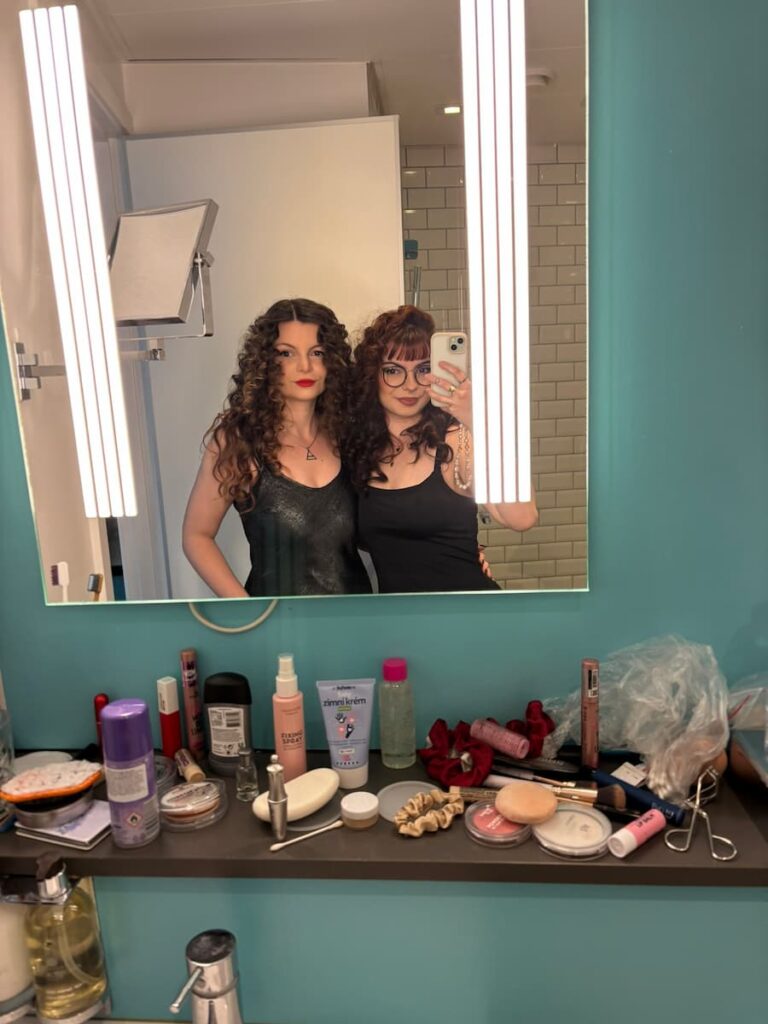 Mirka and her sister getting ready for Mirka's wedding
