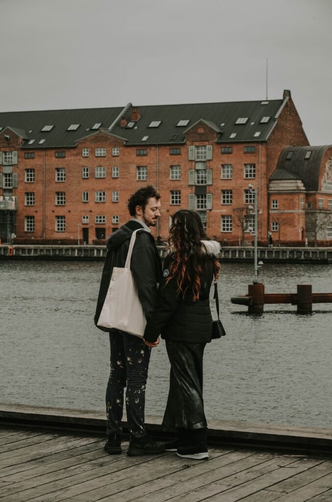 Mirka and Daniel by a canal in Copenhagen on their wedding day
