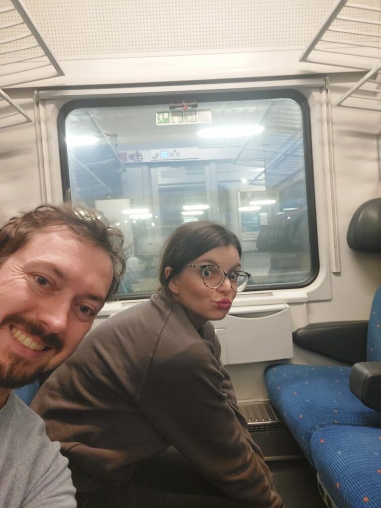 Mirka and Daniel in a train cabin
