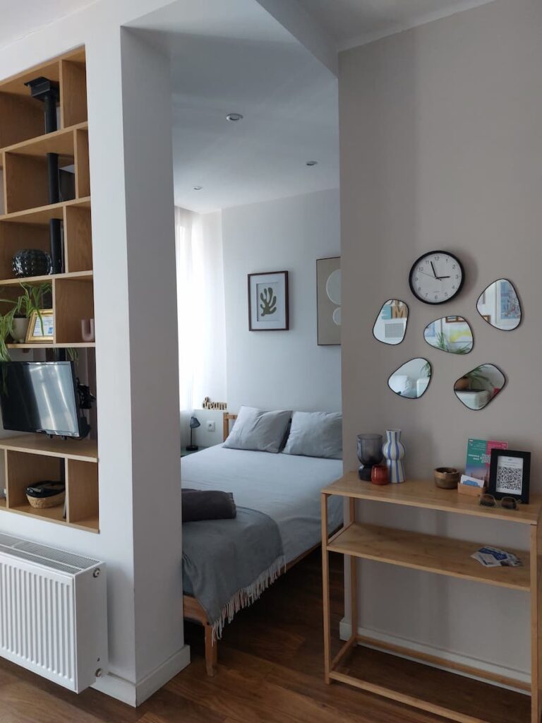 A bed in an apartment in Warsaw