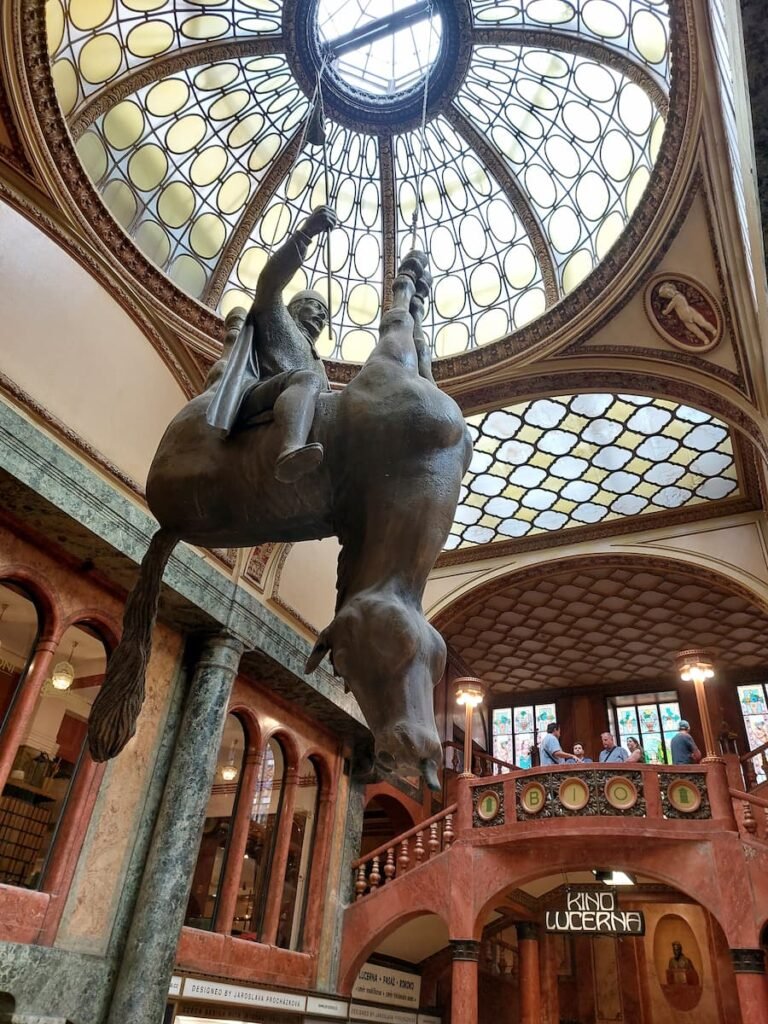 Paternoster Elevator in Prague: All You Need to Know 8 Upside down horse in Palace Lucerna