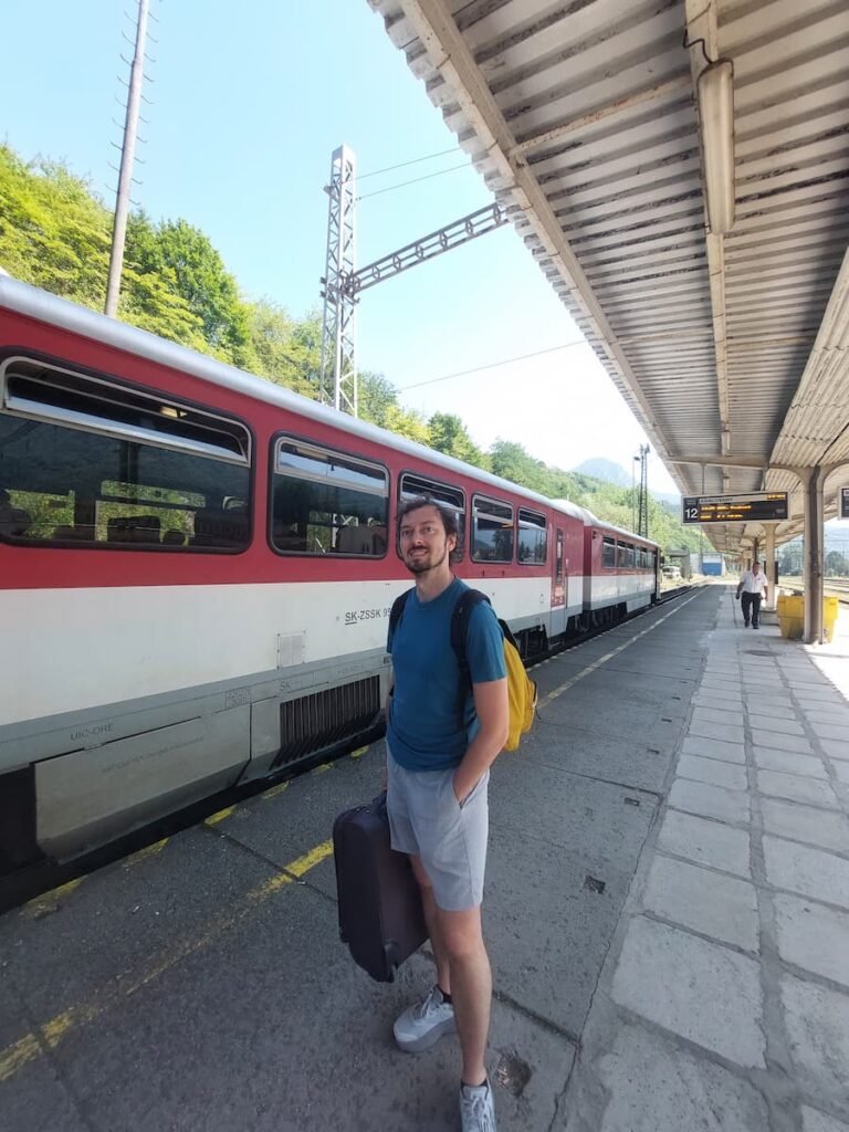 How to Visit Orava Castle Without a Car (+ Insider Tips) 2 Daniel on a train station platform