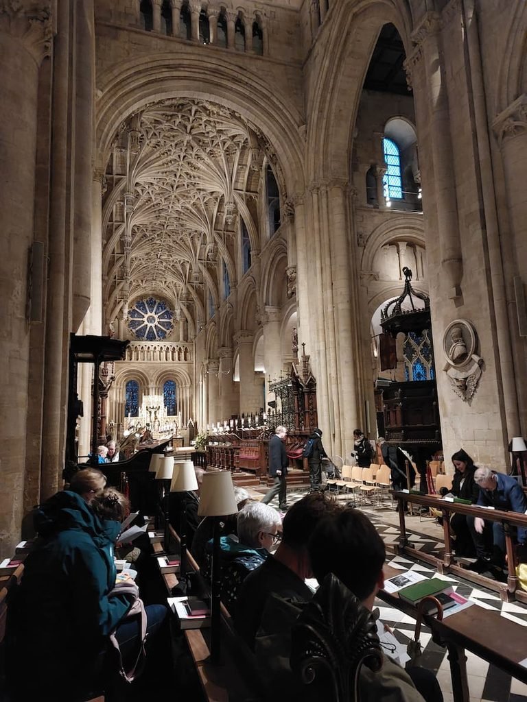 People in Christ Church College Cathedral during an evensong