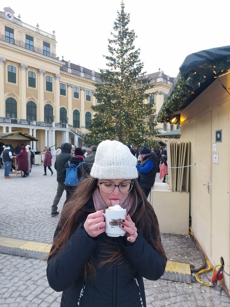 Vienna Christmas Markets from Bratislava: Insider Tips 15 Mirka with a Christmas mug at the Belvedere Christmas market